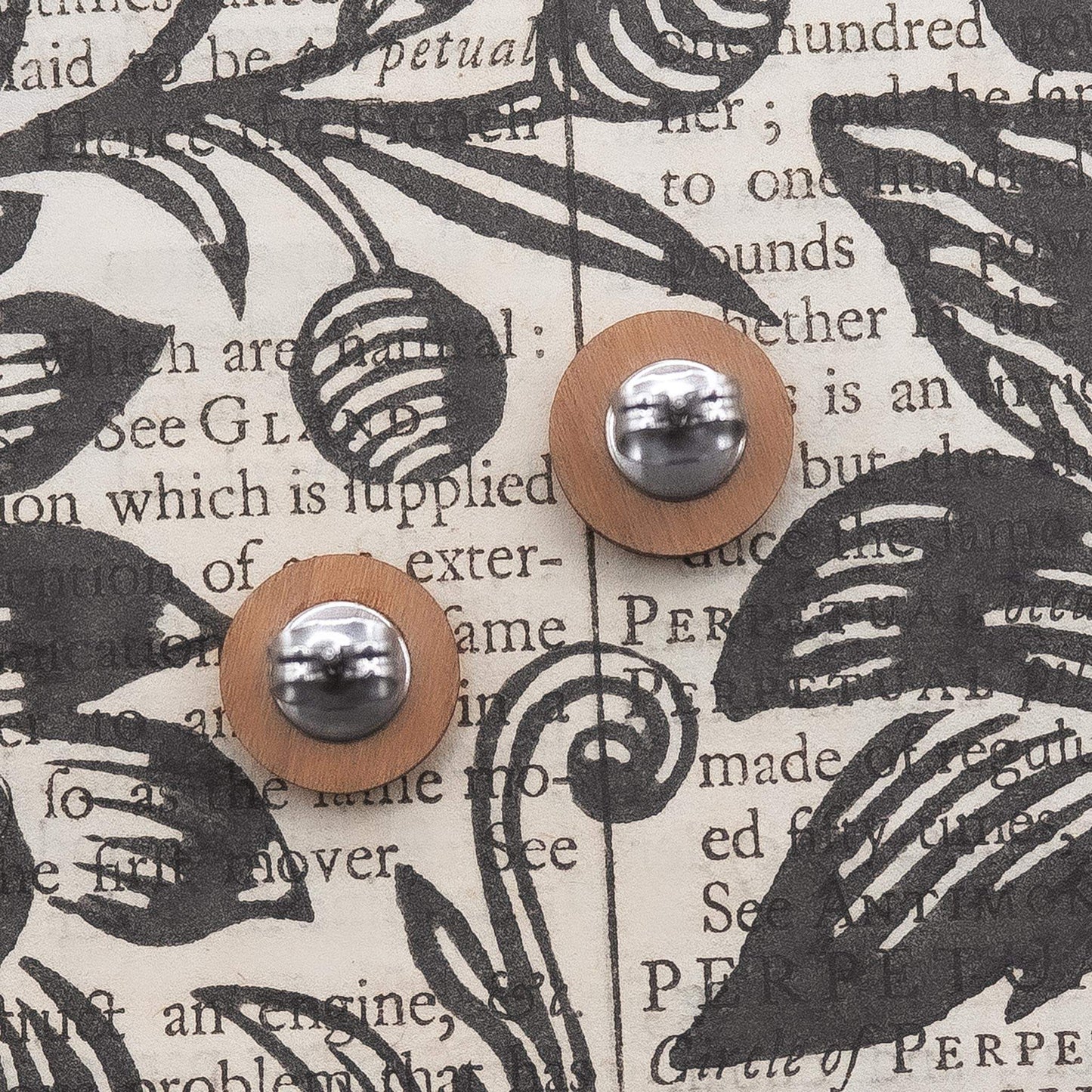 Solid cherry black and white geometric painted studs