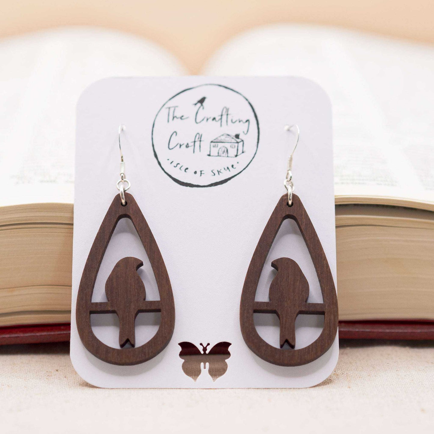 Teardrop bird drop earrings on delicate Sterling Silver hooks.