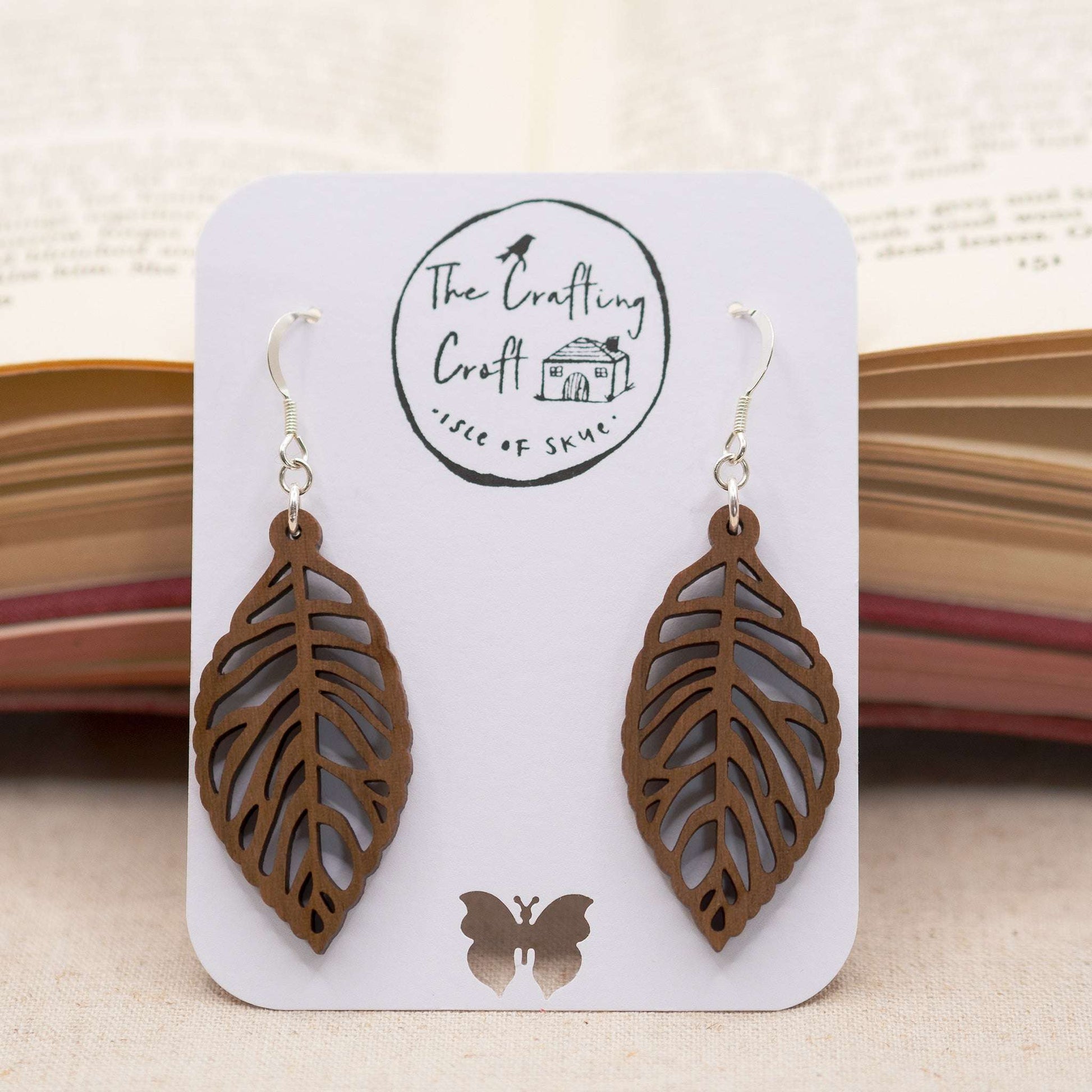 Leaf skeleton drop earrings solid walnut wood laser cut with delicate beeswax coating