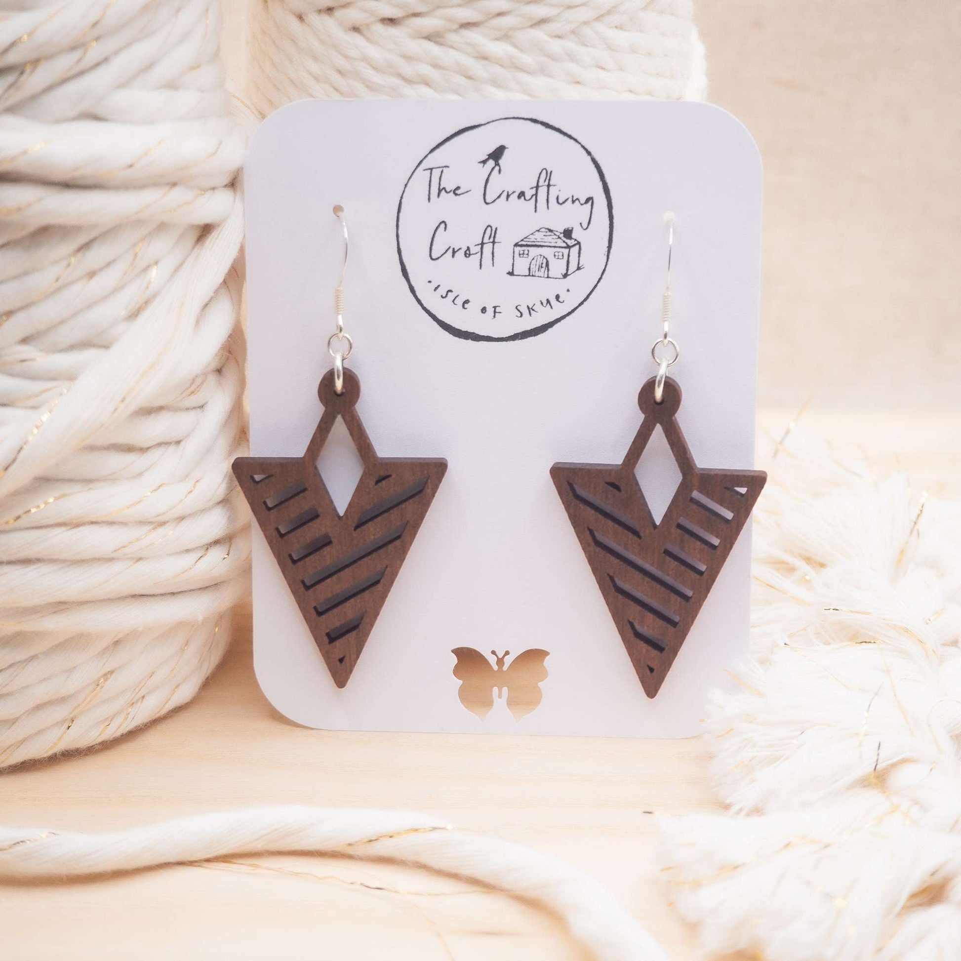 Chevron triangle drop earrings in solid walnut wood, laser cut and with a light beeswax coating for protection