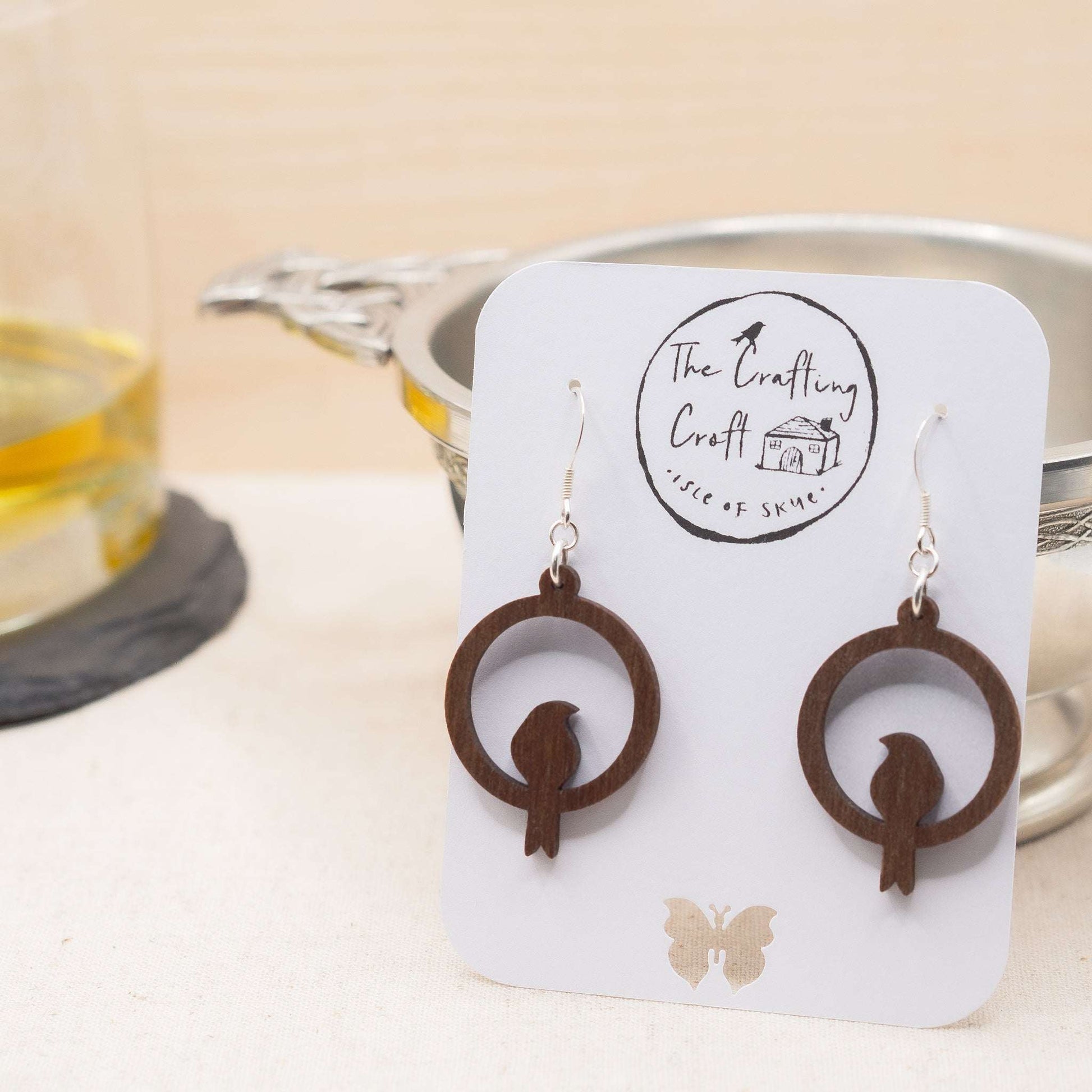 Perching bird drop earrings for someone special