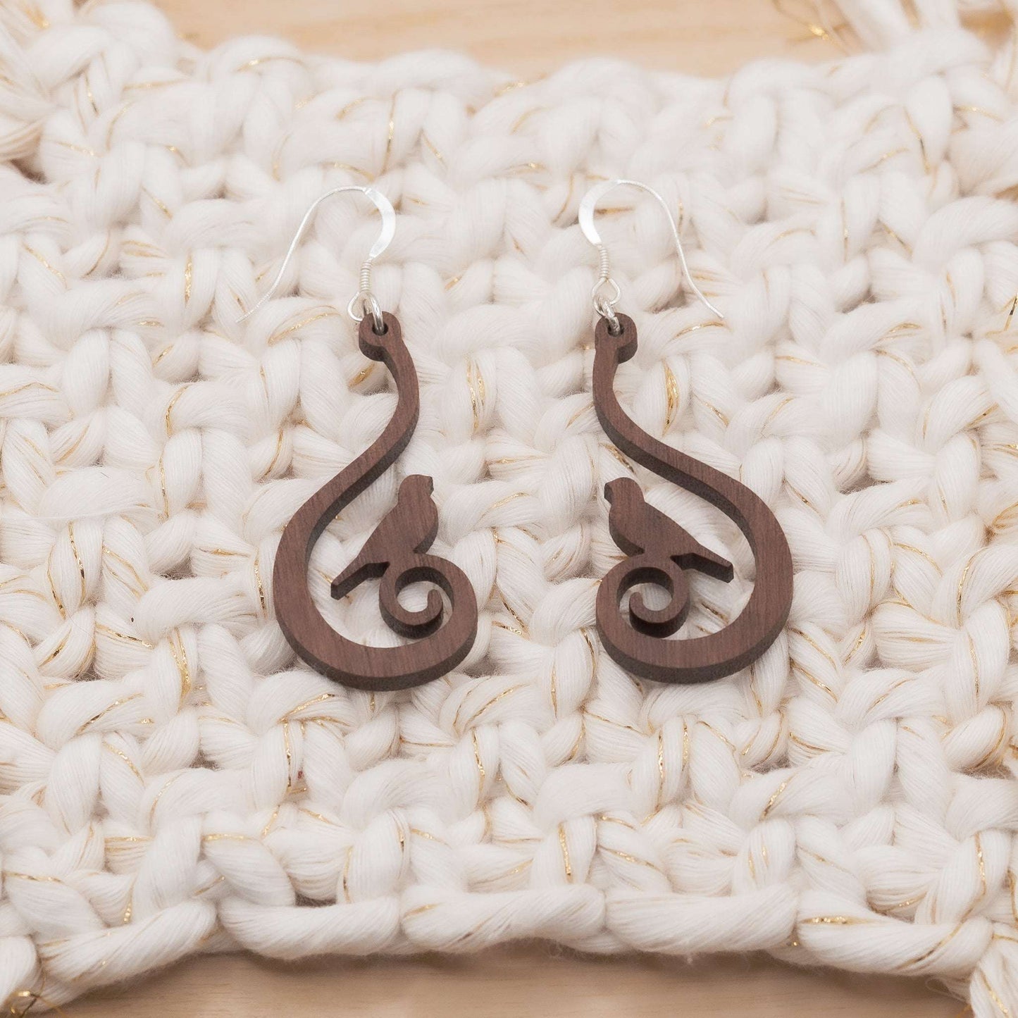 Swirling bird drop earrings a thoughtful and unique gift