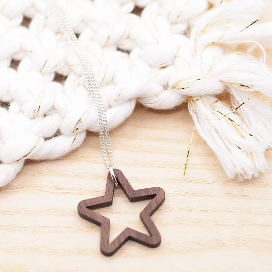 Chunky star necklace in walnut wood. Hung on an 18" 100% recycled sterling silver chain 