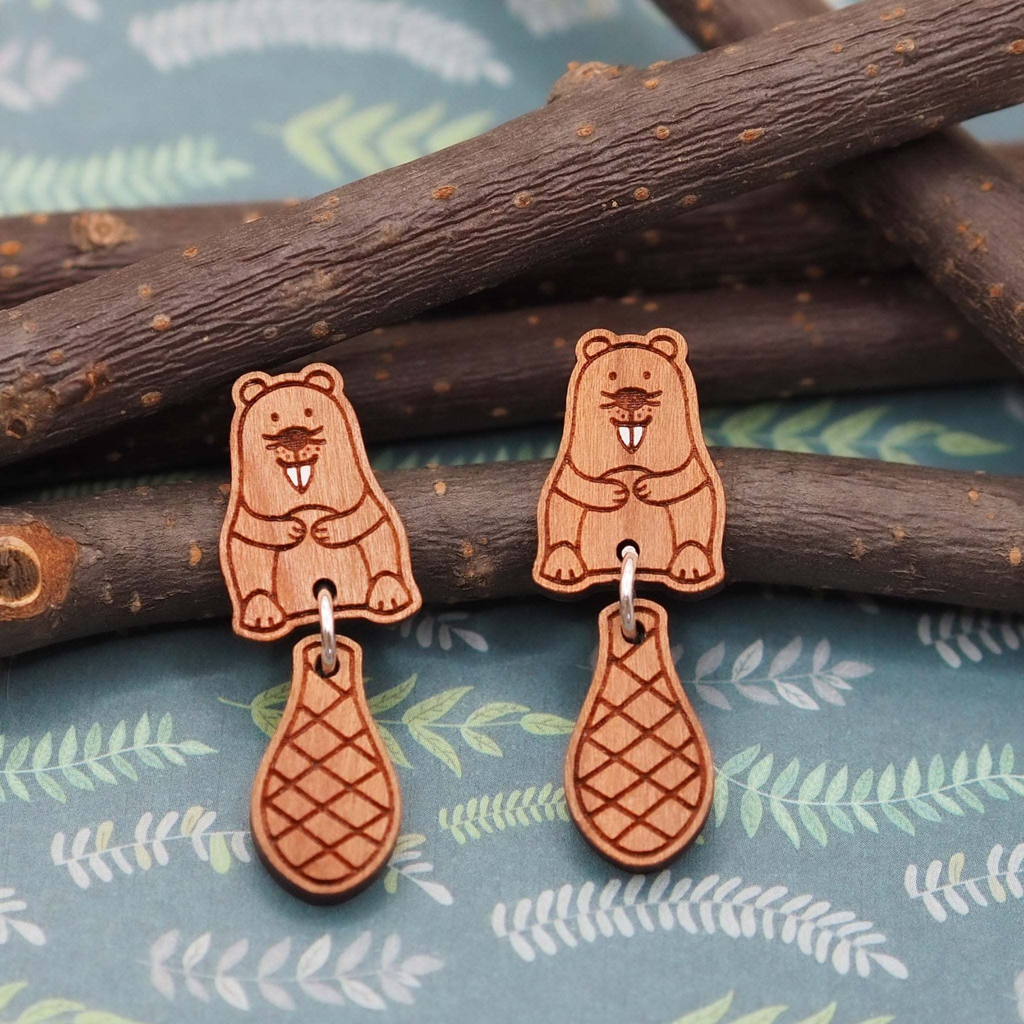 Dangling beaver tail stud earrings 