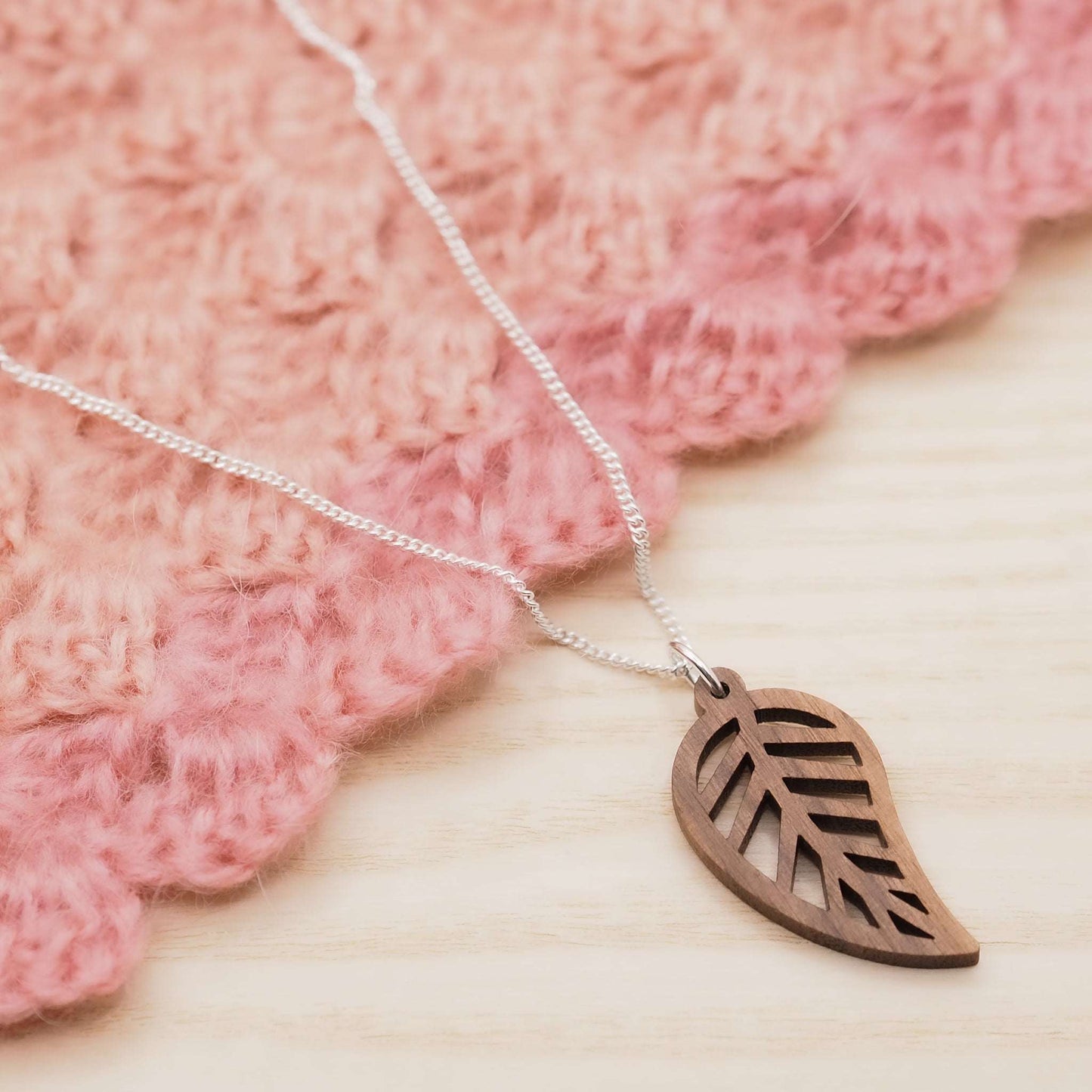 Delicate leaf outline necklace on a sterling silver chain