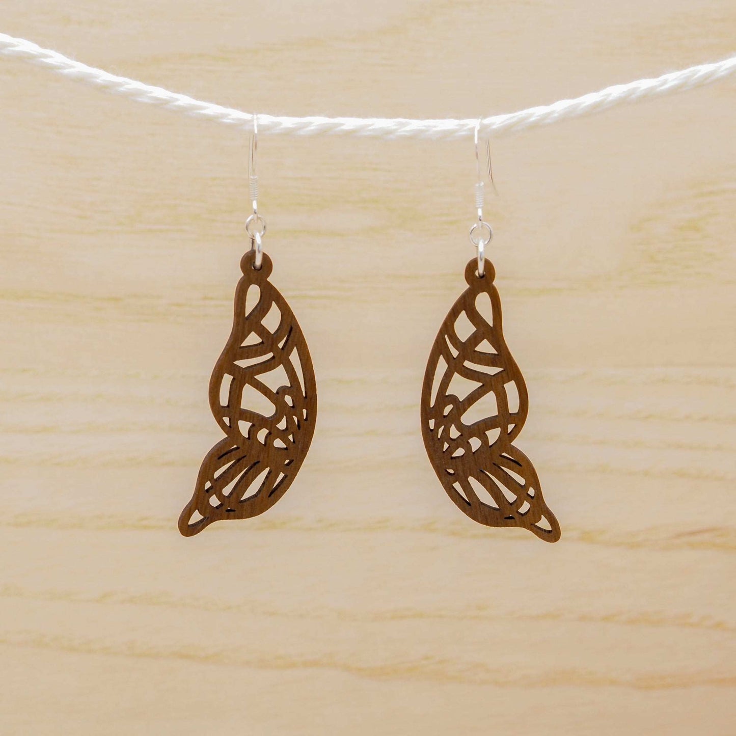 Butterfly wing drop earrings laser cut with delicate beeswax finish. The perfect gift