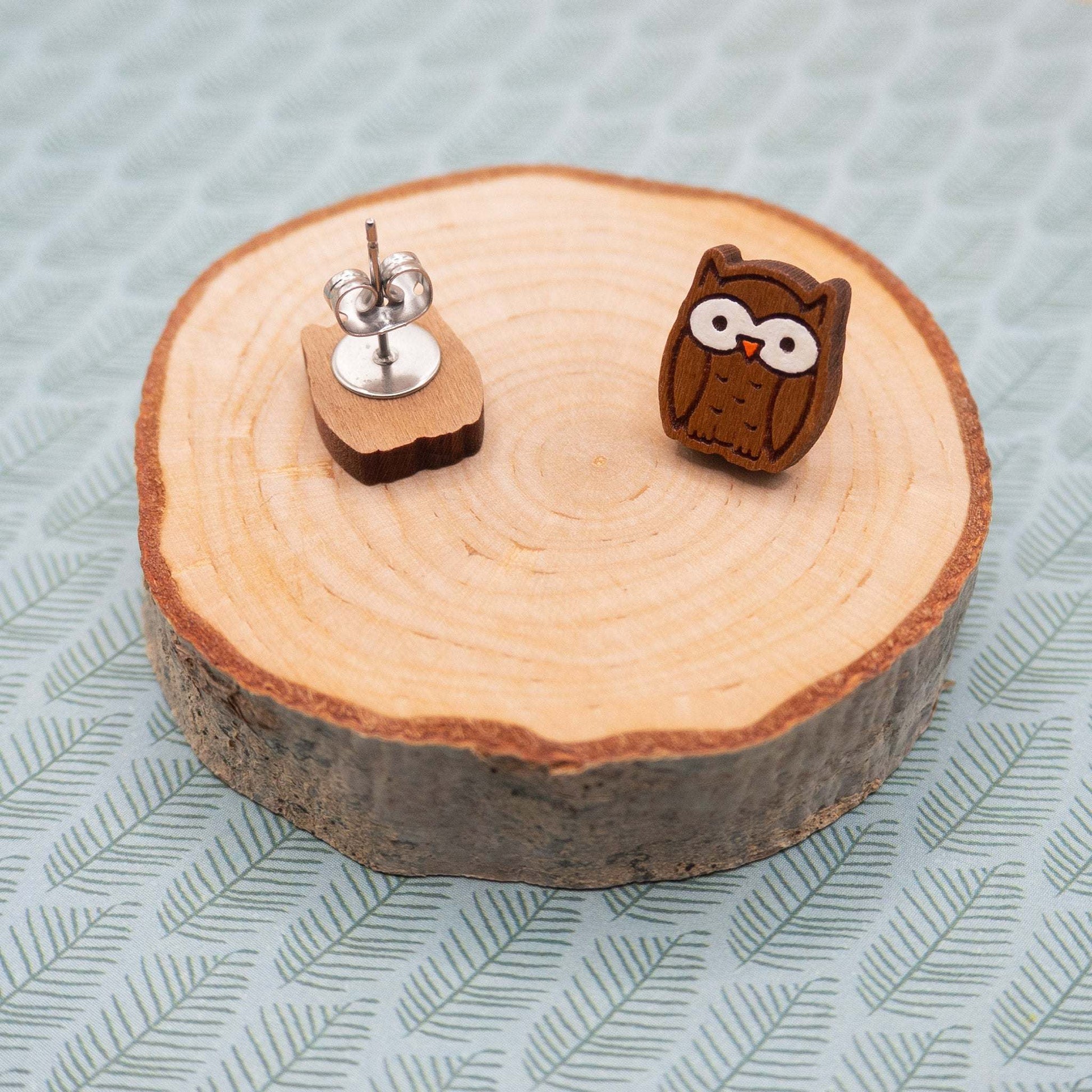 Turn heads with our owl stud earrings 