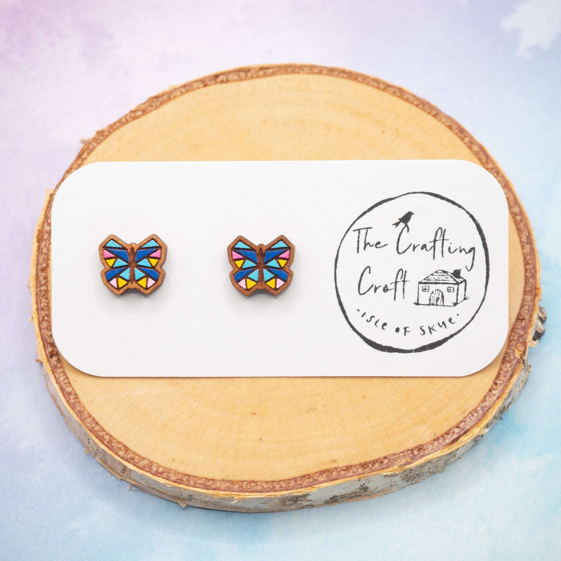 blue butterfly painted stud earrings lovingly made on The Isle of Skye Scotland