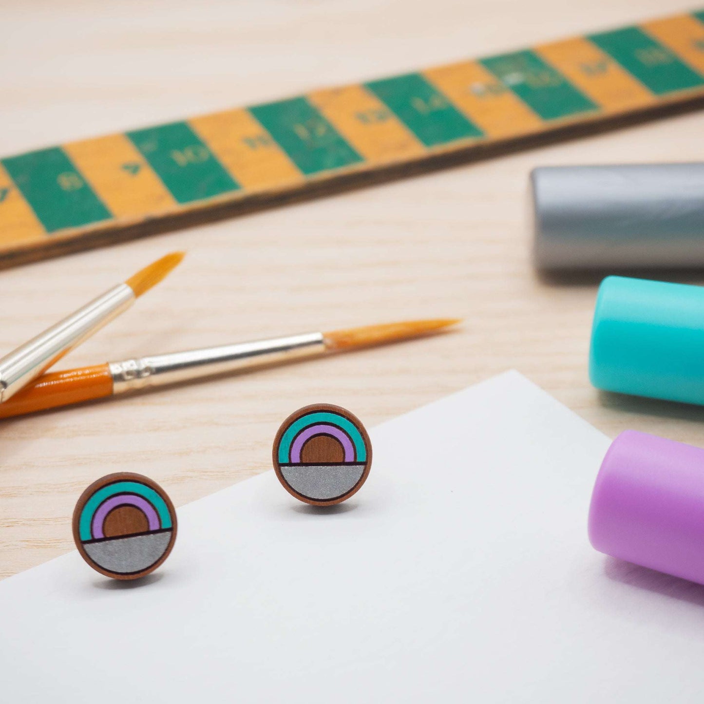 The perfect gift our teal rainbow style painted stud earrings